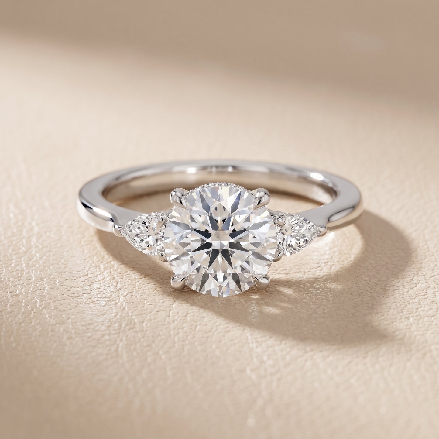 Leila Three-Stone Round Diamond Engagement Ring in Platinum - front.jpg