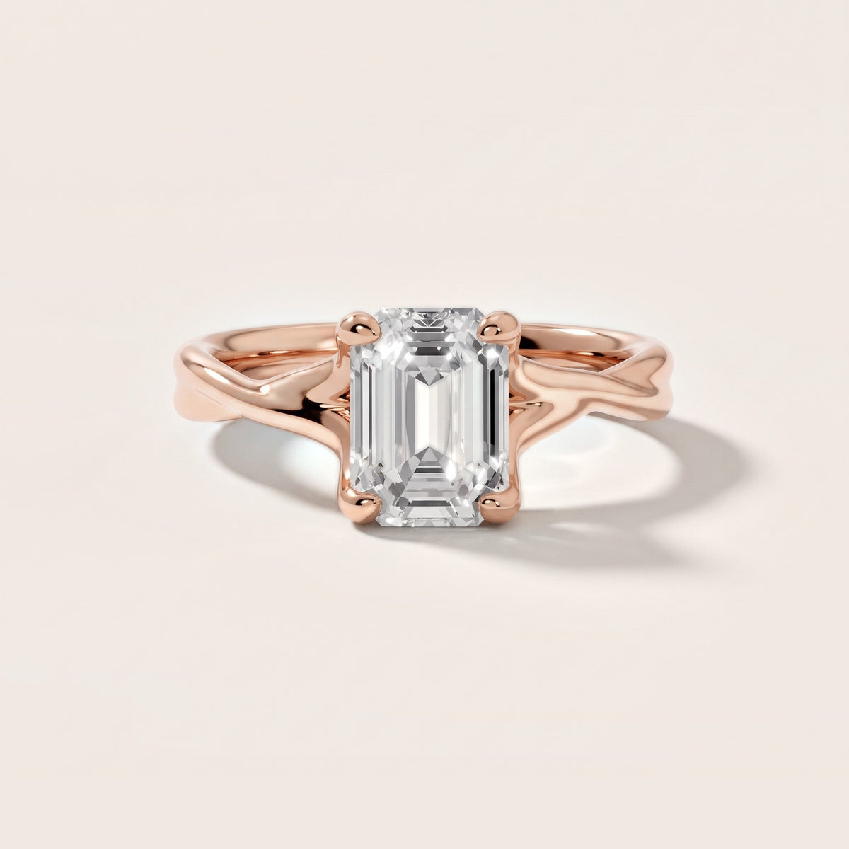 Rosa Twist Solitaire Emerald Diamond Engagement Ring in Rose Gold - front.jpg