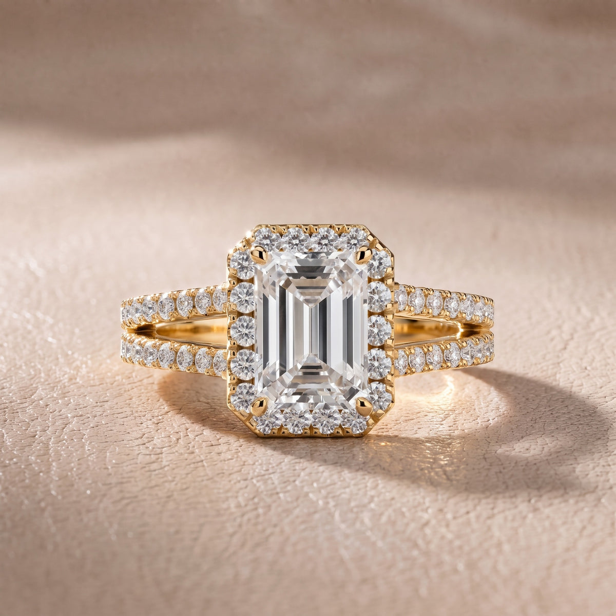 Kira Halo Split Shank Emerald Diamond Engagement Ring in Yellow Gold - front.jpg