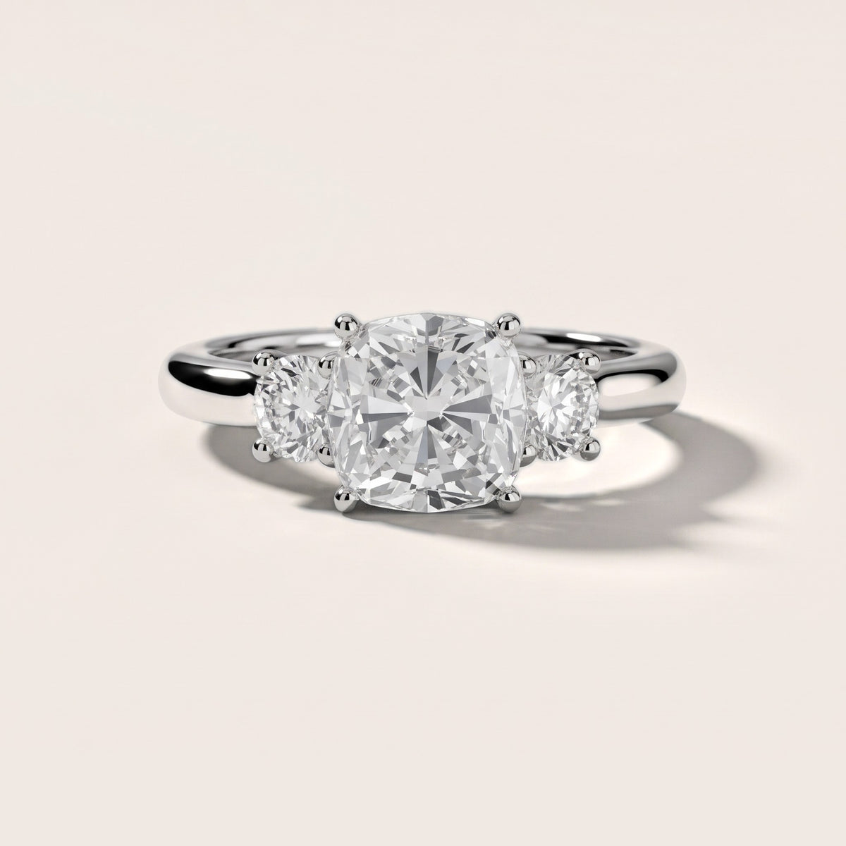 Gemma Three-Stone Cushion Diamond Engagement Ring in Silver - front.jpg