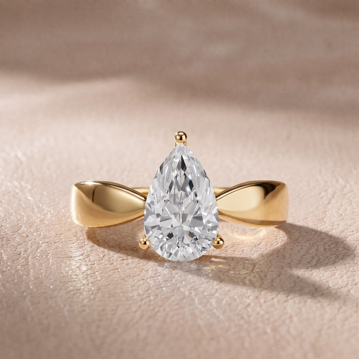 Talia Solitaire Twist Pear Diamond Engagement Ring in Yellow Gold - front.jpg