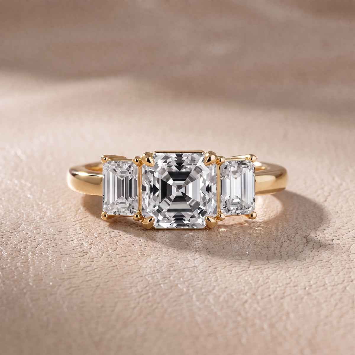 Zoe Three-Stone Asscher Diamond Engagement Ring in Yellow Gold - front.jpg