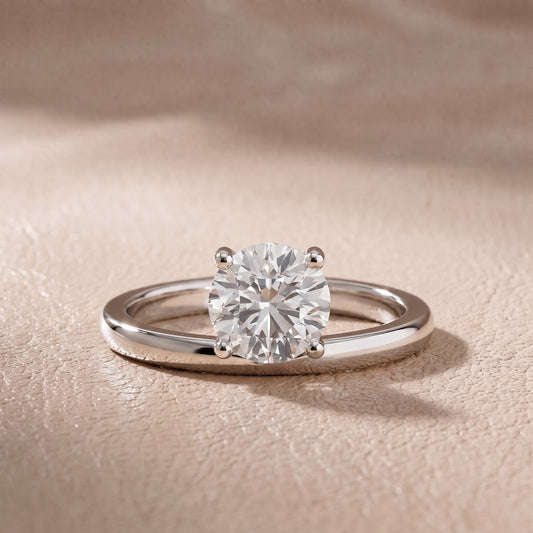 Maisie Four Prong Solitaire Round Diamond Engagement Ring in Platinum - front.jpg
