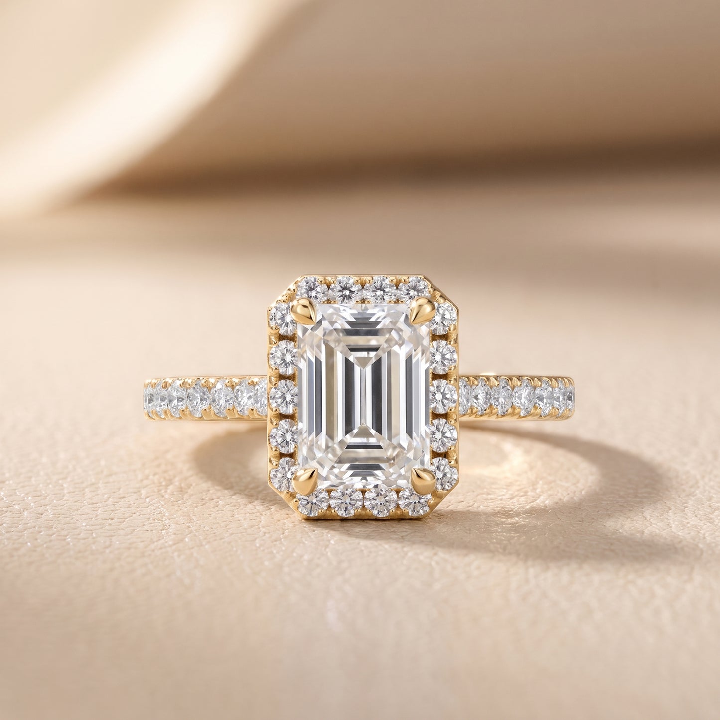 Amara Halo Claw Prong Emerald Diamond Ring in Yellow Gold - front.jpg