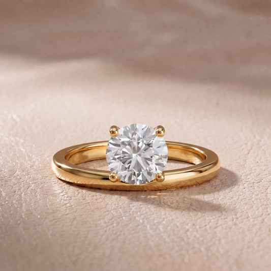 Maisie Four Prong Solitaire Round Diamond Engagement Ring in Yellow Gold - front.jpg