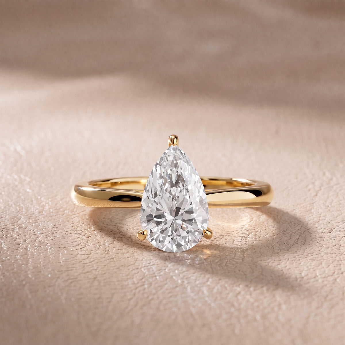 Kalia Knife Edge Solitaire Pear Diamond Engagement Ring in Yellow Gold - front.jpg
