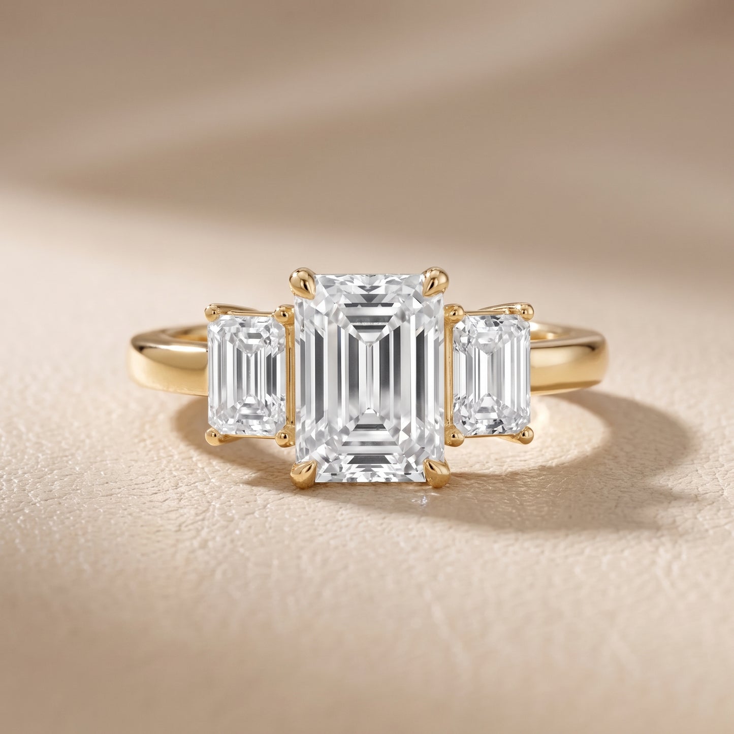 Zoe Three-Stone Emerald Diamond Ring in Yellow Gold - front.jpg