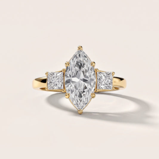 Aria Three-Stone Basket Marquise Diamond Engagement Ring in Yellow Gold