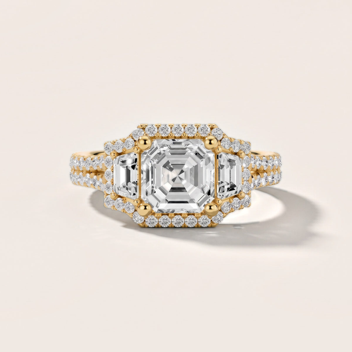 Ronan Three-Stone Halo Asscher Diamond Engagement Ring in Yellow Gold - front.jpg