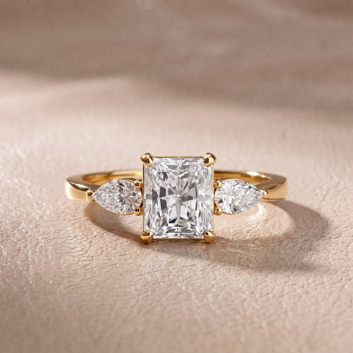 Grace Three Stone Radiant Diamond Engagement Ring in Yellow Gold - front.jpg
