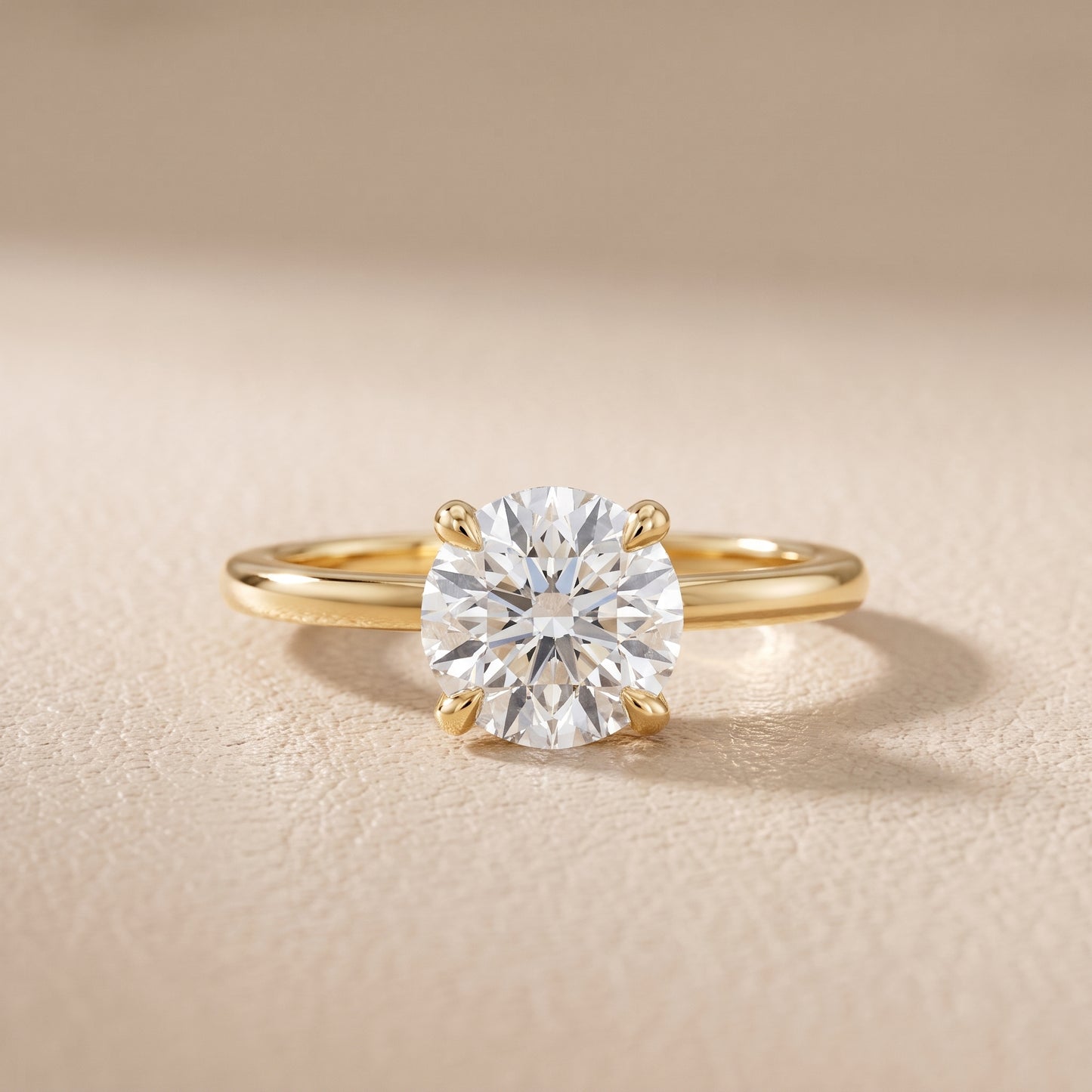 Nella Petite Solitaire Round Diamond Engagement Ring in Yellow Gold - front.jpg