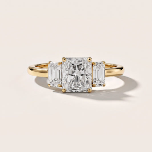 Marian Three-Stone Hidden Halo Radiant Diamond Engagement Ring in Yellow Gold