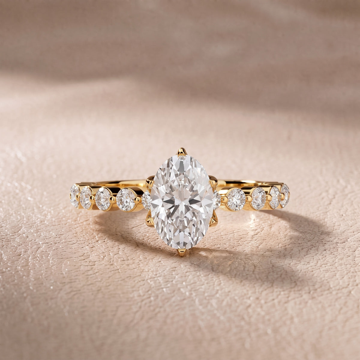 Eleanor Majesty Side Stone Oval Diamond Engagement Ring in Yellow Gold - front.jpg