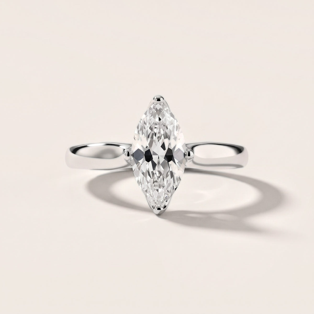 Edwina Crossover Solitaire Marquise Diamond Engagement Ring in Platinum - front.jpg