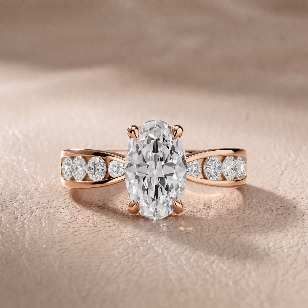 Rosalie Channel Set Sidestone Oval Diamond Engagement Ring in Rose Gold - front.jpg