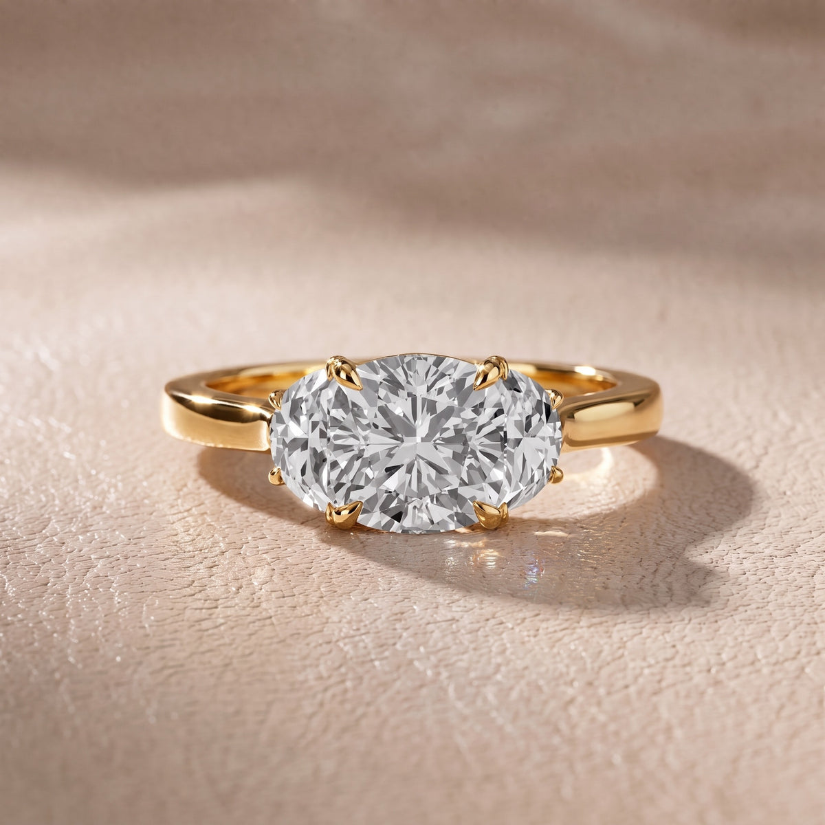 Romy Three-Stone Cushion Diamond Engagement Ring in Yellow Gold - front.jpg