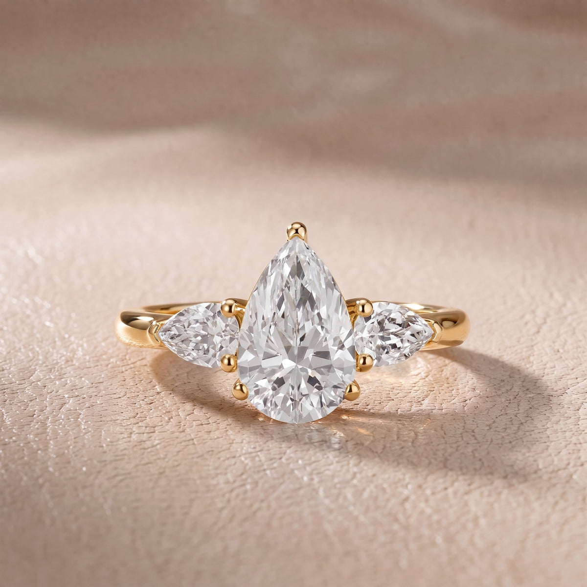 Sophia Three-Stone Pear Diamond Engagement Ring in Yellow Gold - front.jpg