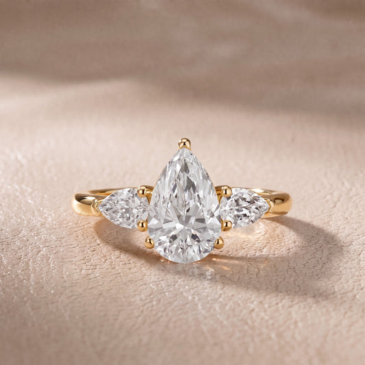 Sophia Three-Stone Pear Diamond Engagement Ring in Yellow Gold - front.jpg