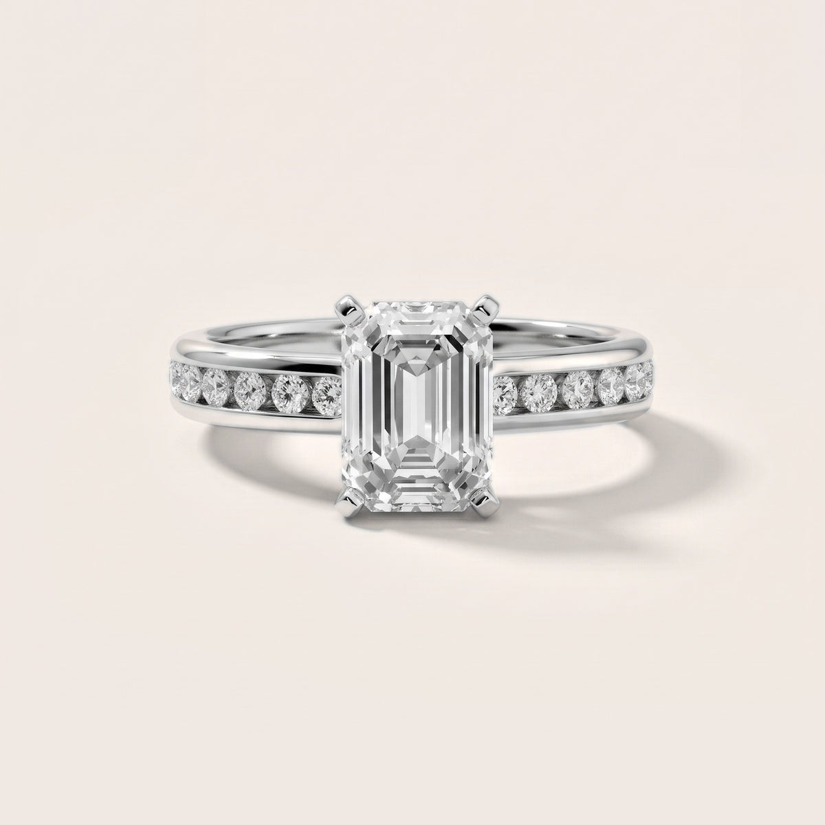 Avalon Channel Set Emerald Diamond Engagement Ring in Platinum - front.jpg