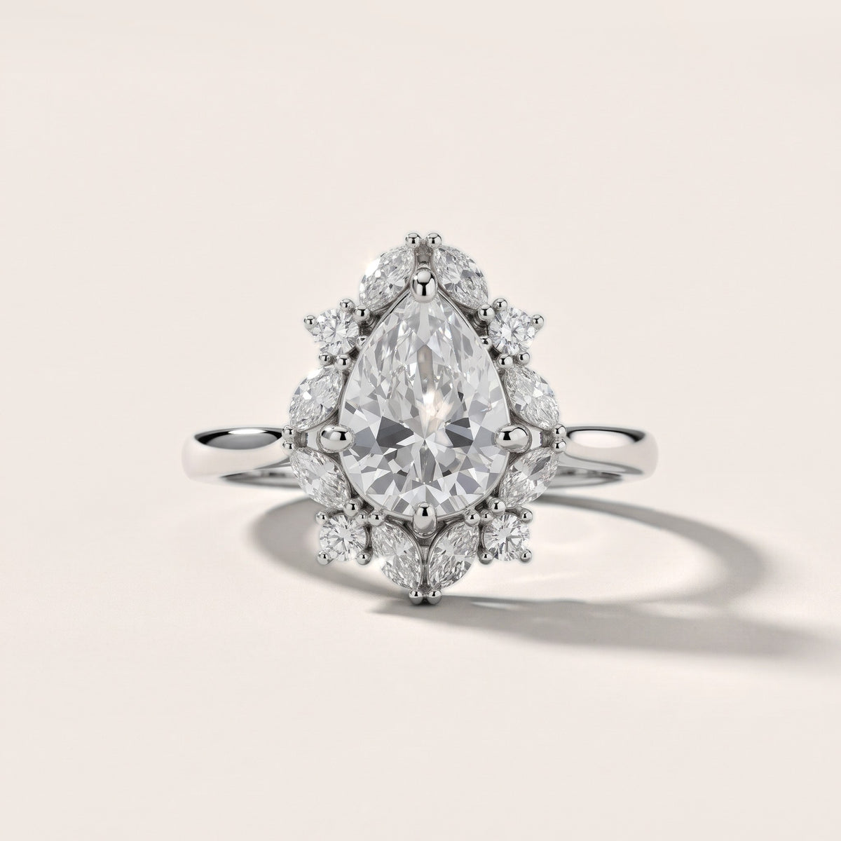 Brynn Starburst Cluster Pear Diamond Engagement Ring in Silver - front.jpg
