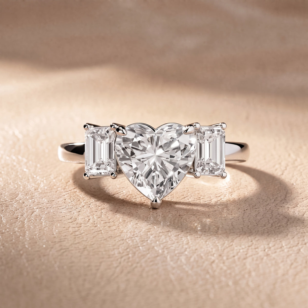 Zoe Three-Stone Heart Diamond Engagement Ring in Platinum - front.jpg