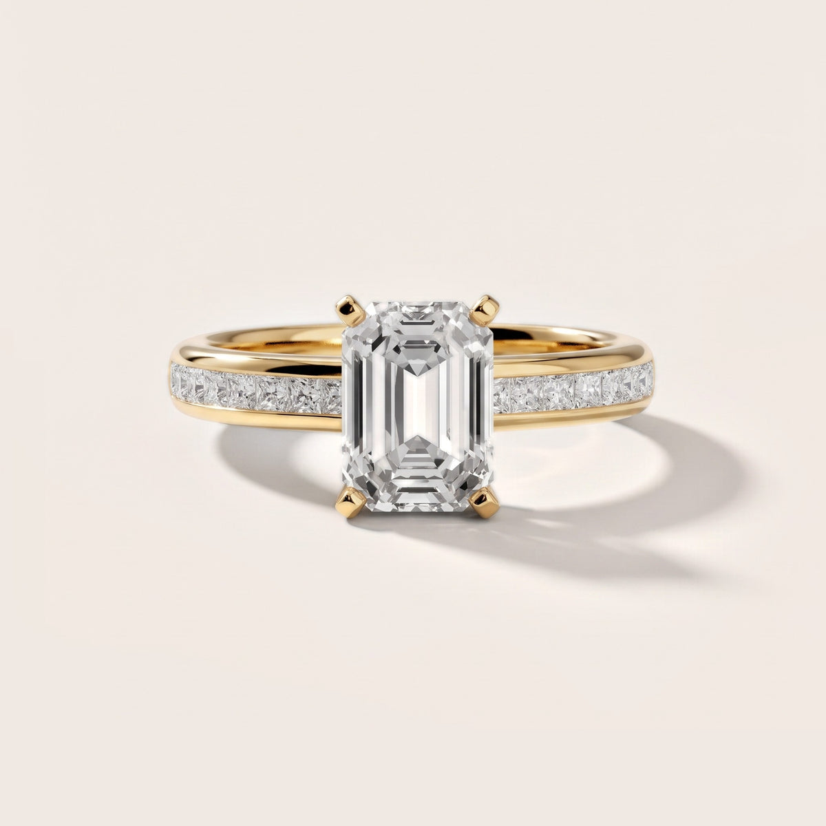 Solano Channel Set Emerald Diamond Engagement Ring in Yellow Gold - front.jpg