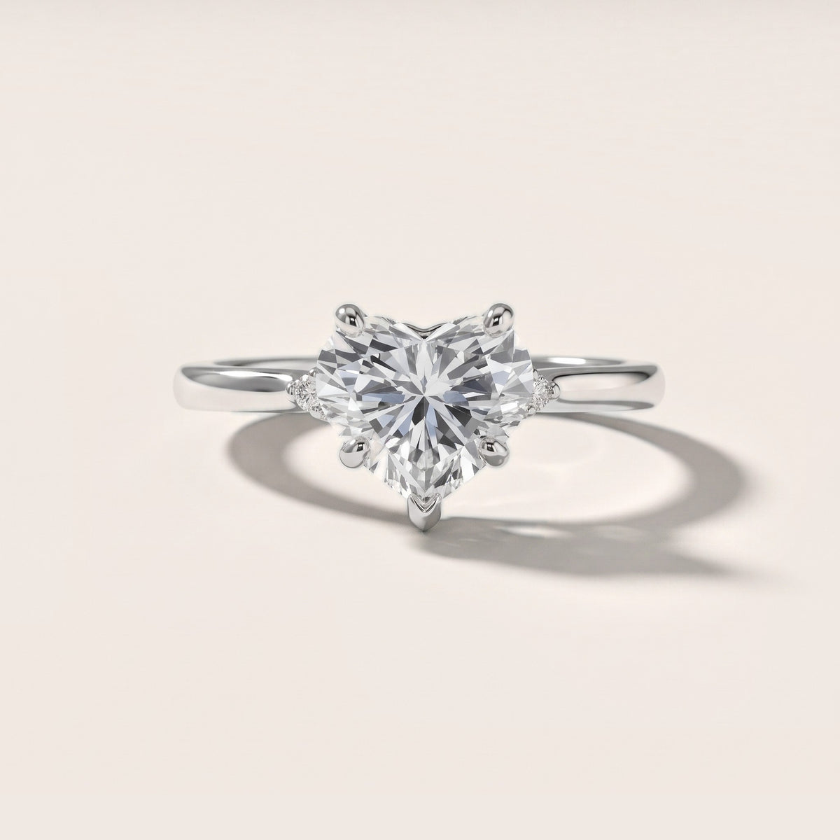 Teodora Floating Three-Stone Heart Diamond Engagement Ring in Platinum - front.jpg