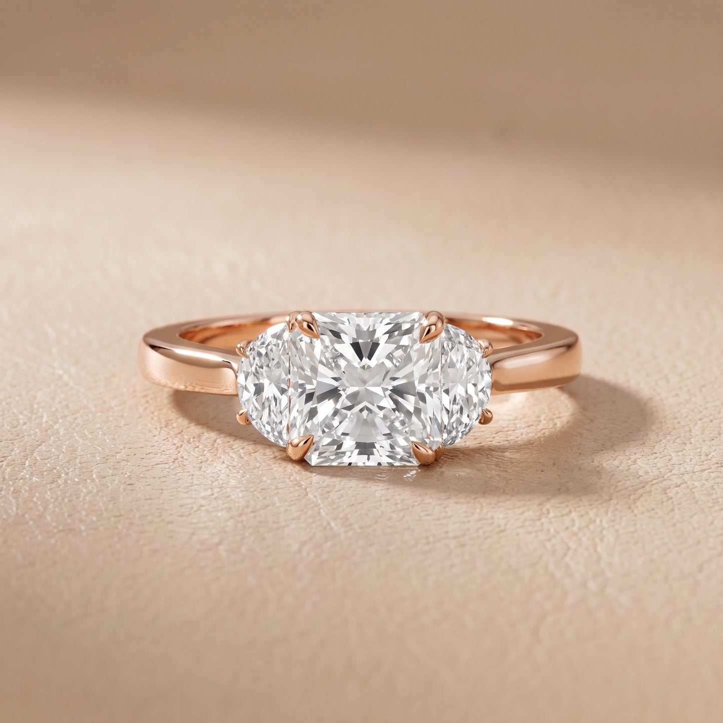 Romy Three-Stone Radiant Diamond Engagement Ring in Rose Gold - front.jpg