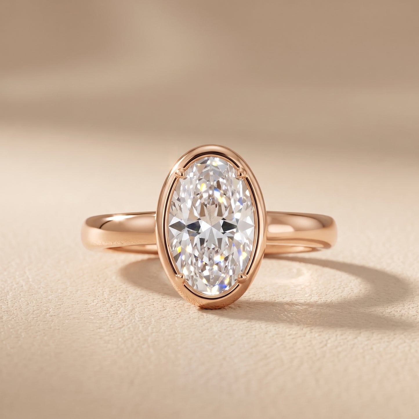 Alina Bezel Solitaire Oval Diamond Ring in Rose Gold - front.jpg