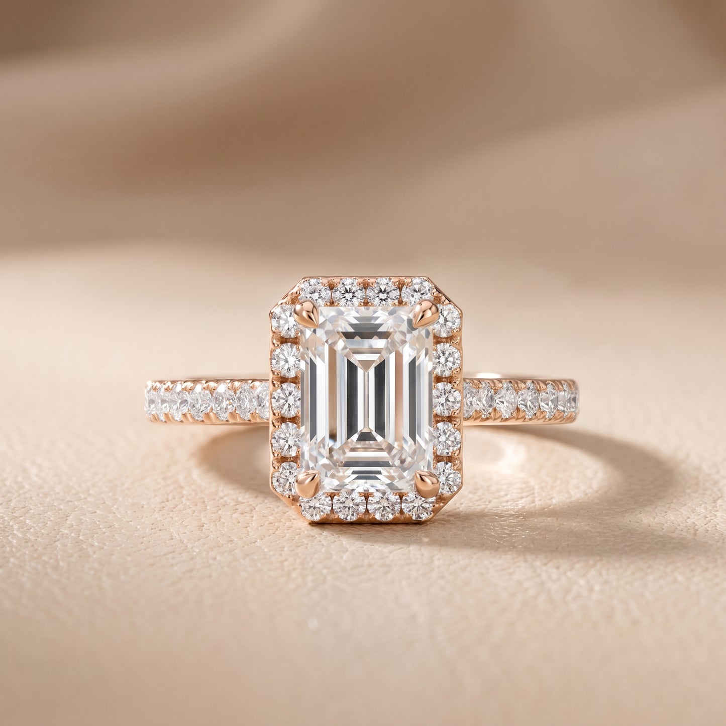 Amara Halo Claw Prong Emerald Diamond Ring in Rose Gold - front.jpg