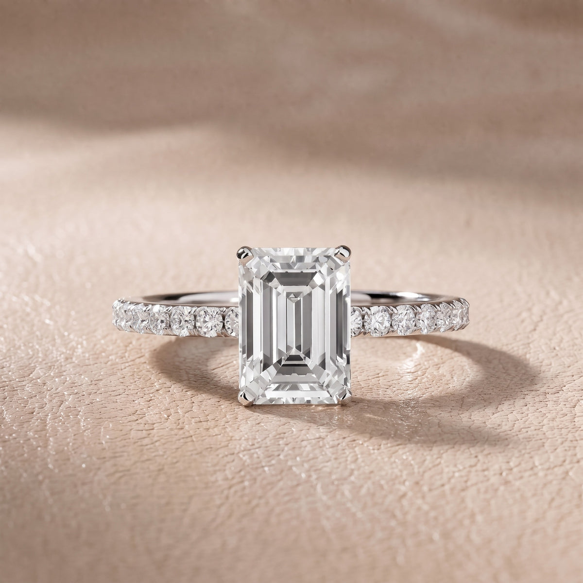Juna French Pavé Solitaire Emerald Diamond Engagement Ring in Platinum - front.jpg