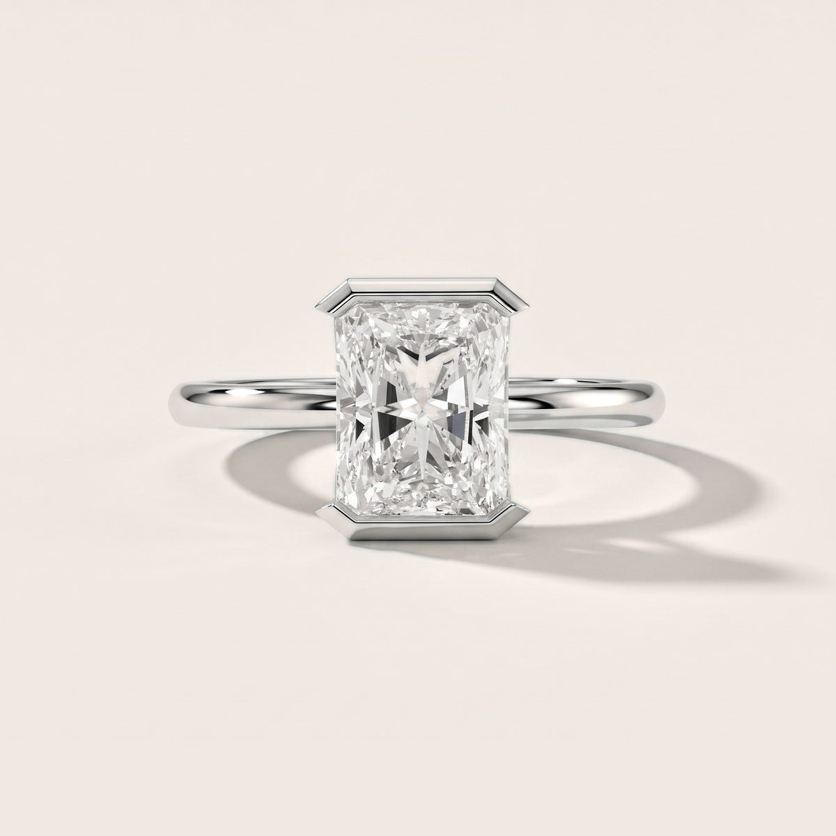Bedford Half Bezel Solitaire Radiant Diamond Engagement Ring in Platinum - front.jpg