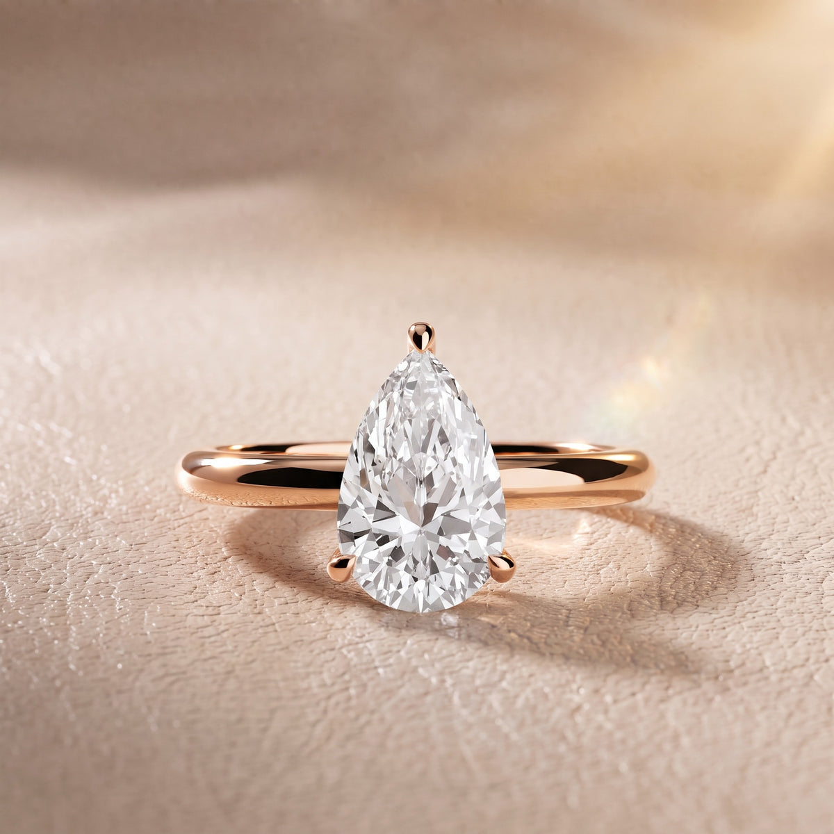 Amaya Hidden Halo Pear Diamond Engagement Ring in Rose Gold - front.jpg