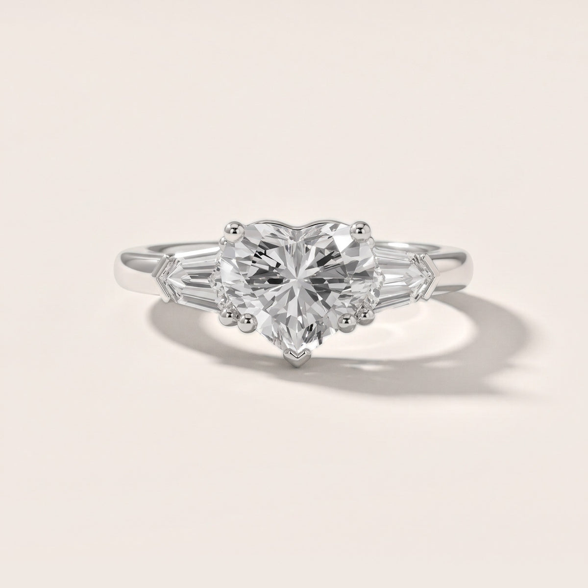Dorothea Baguette Three-Stone Heart Diamond Engagement Ring in White Gold - front.jpg