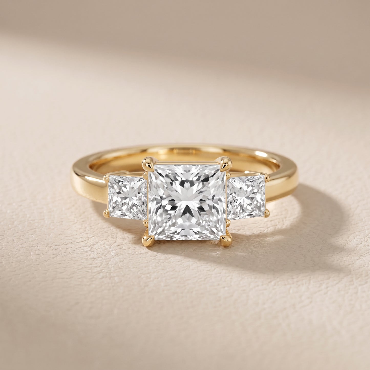 Selena Three-Stone Basket Princess Diamond Ring in Yellow Gold - front.jpg