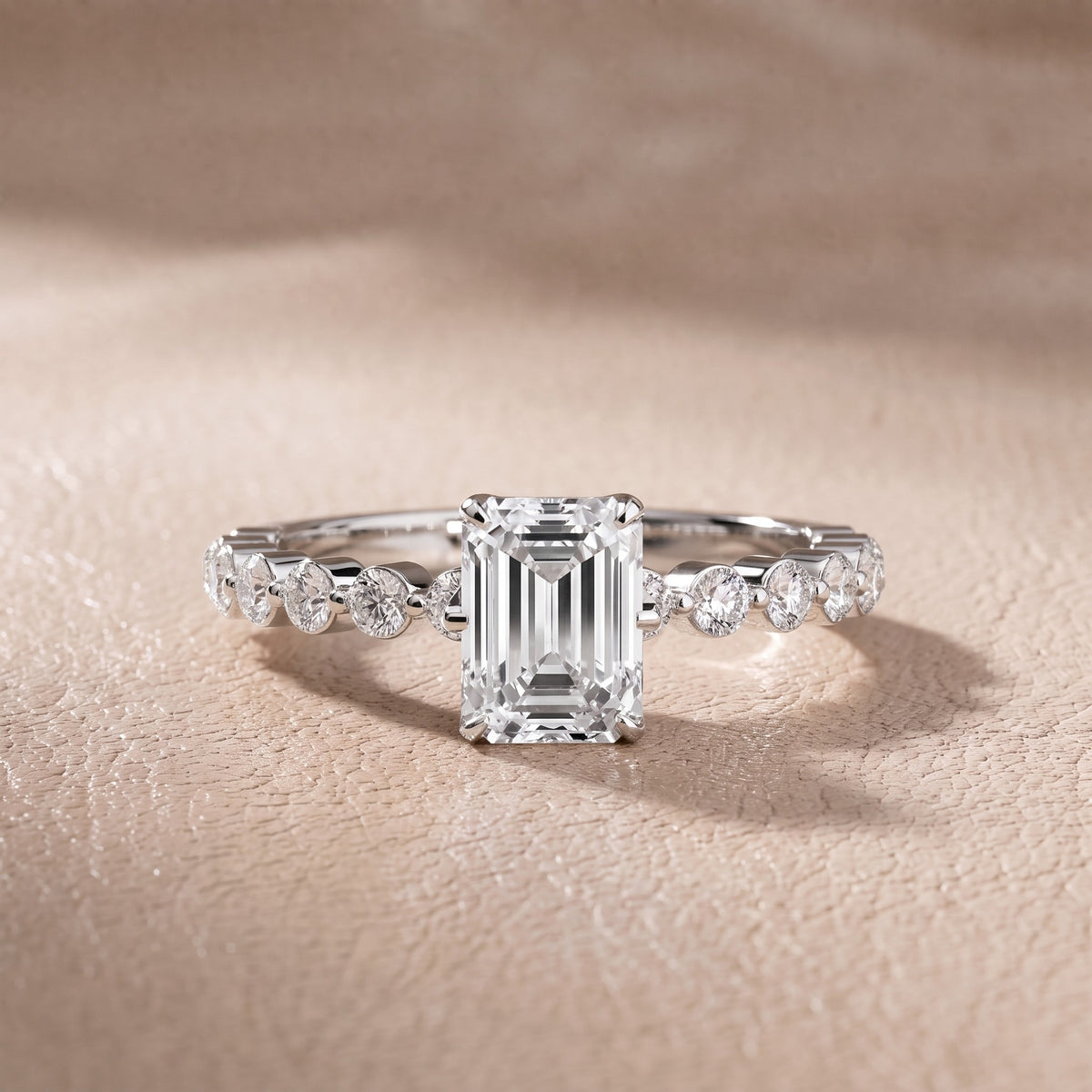 Eleanor Majesty Side Stone Emerald Diamond Engagement Ring in Platinum - front.jpg