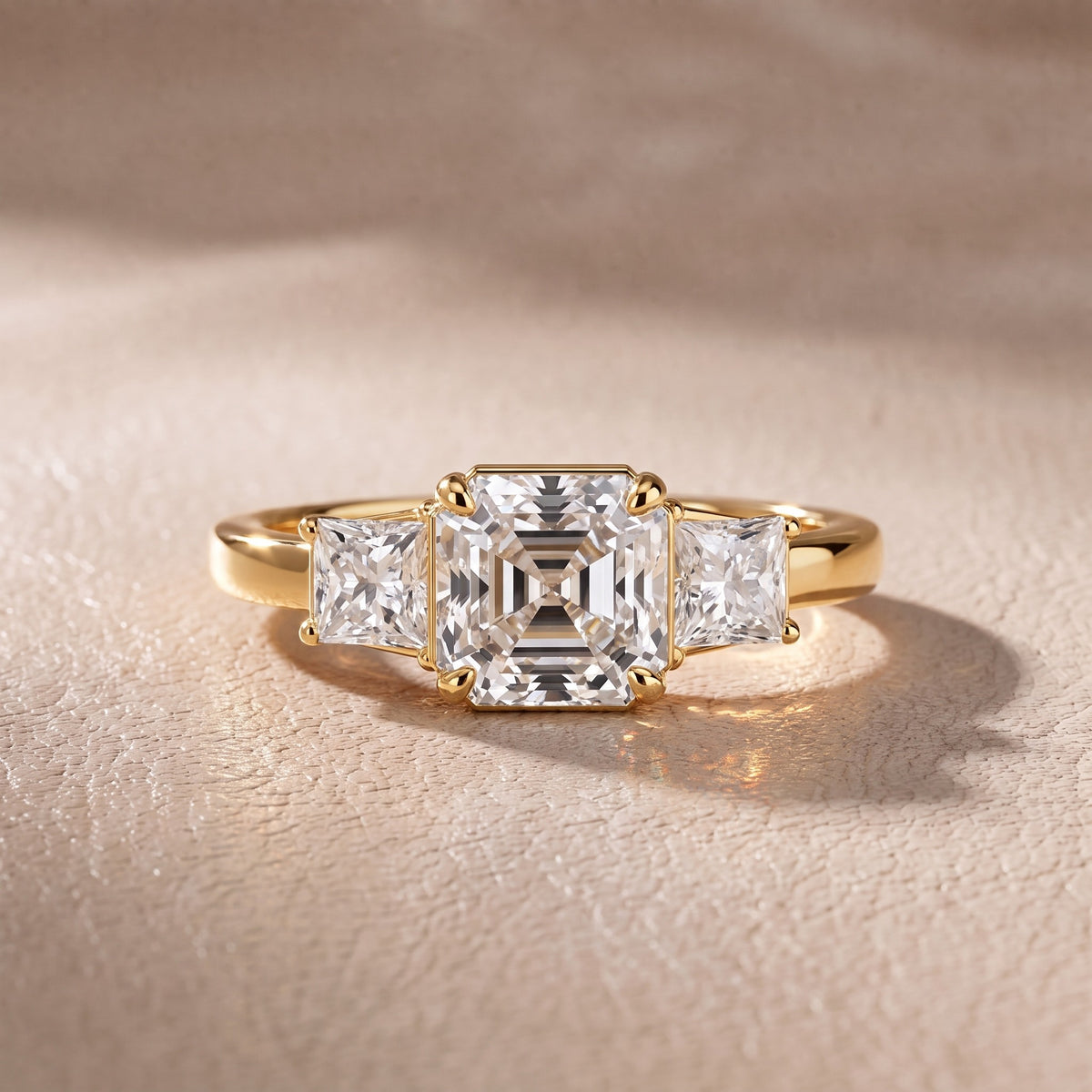 Aria Three-Stone Basket Asscher Diamond Engagement Ring in Yellow Gold - front.jpg