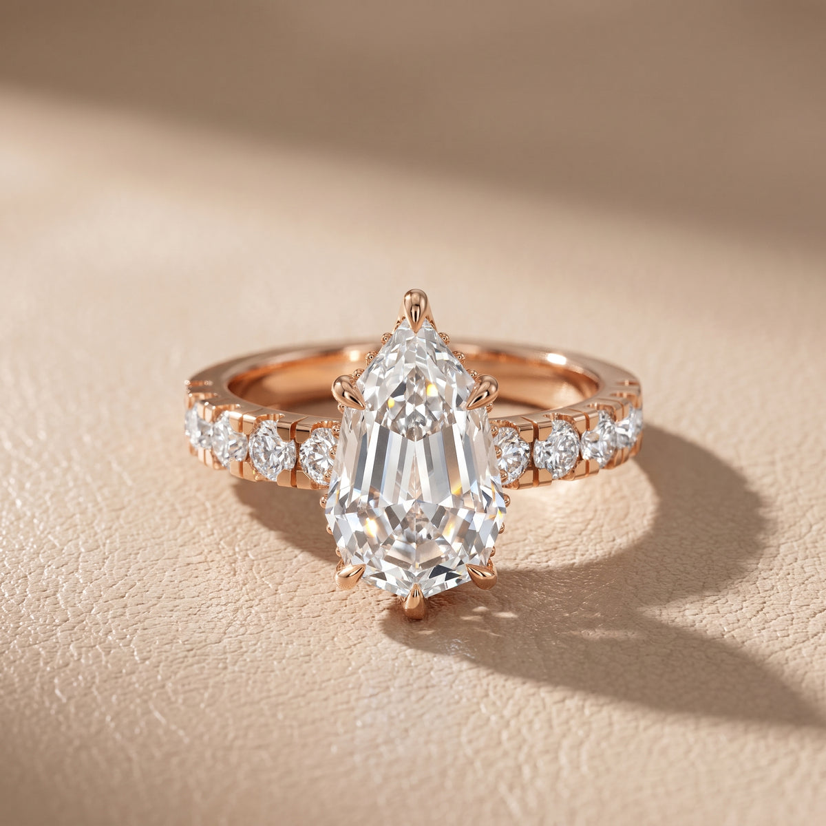 Delaney Hidden Halo French Pavé Step Cut Pear Diamond Engagement Ring in Rose Gold - front.jpg