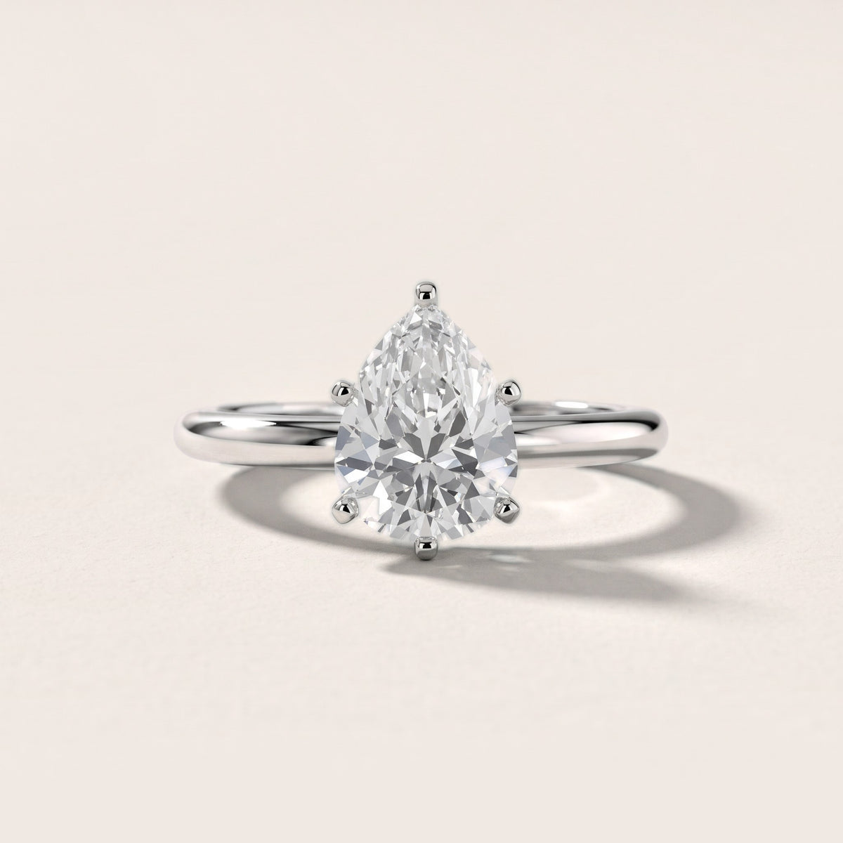 Aida Solitaire Knife Edge Pear Diamond Engagement Ring in Silver - front.jpg