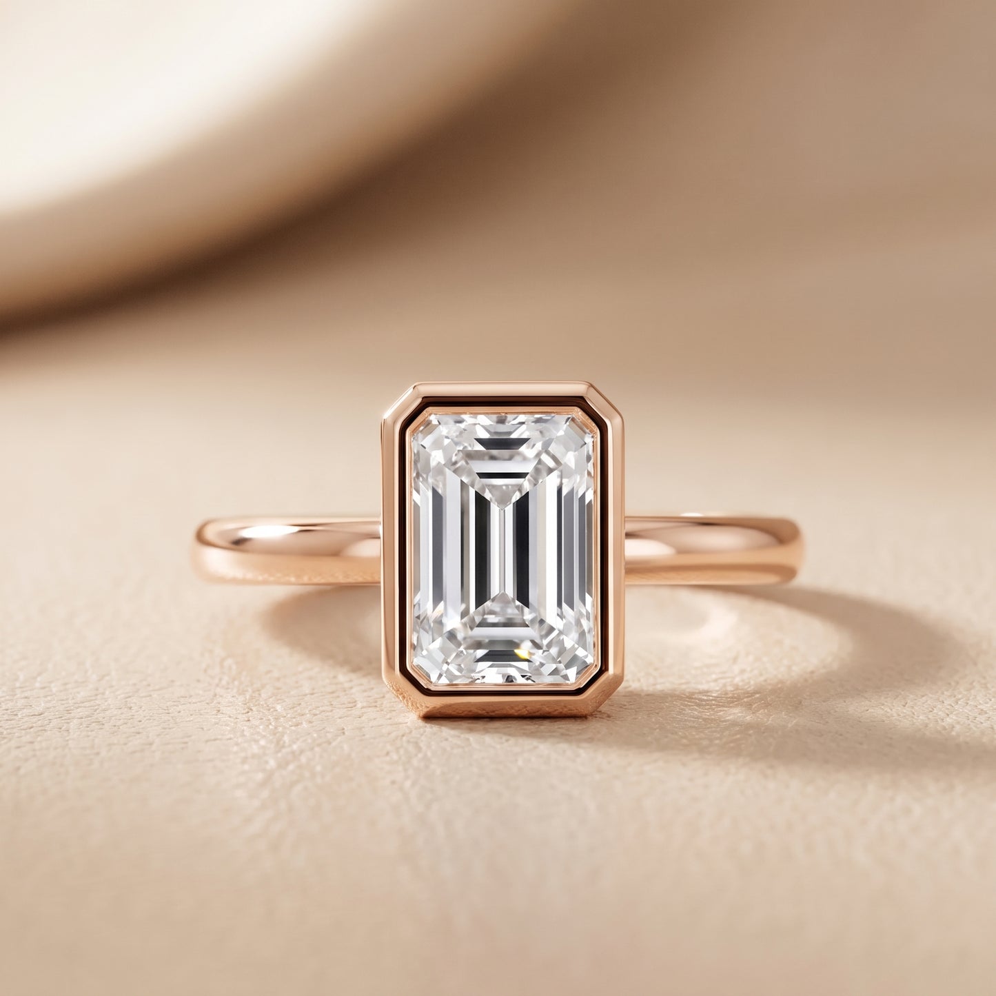 Maeve Bezel Solitaire Emerald Diamond Ring in Rose Gold - front.jpg