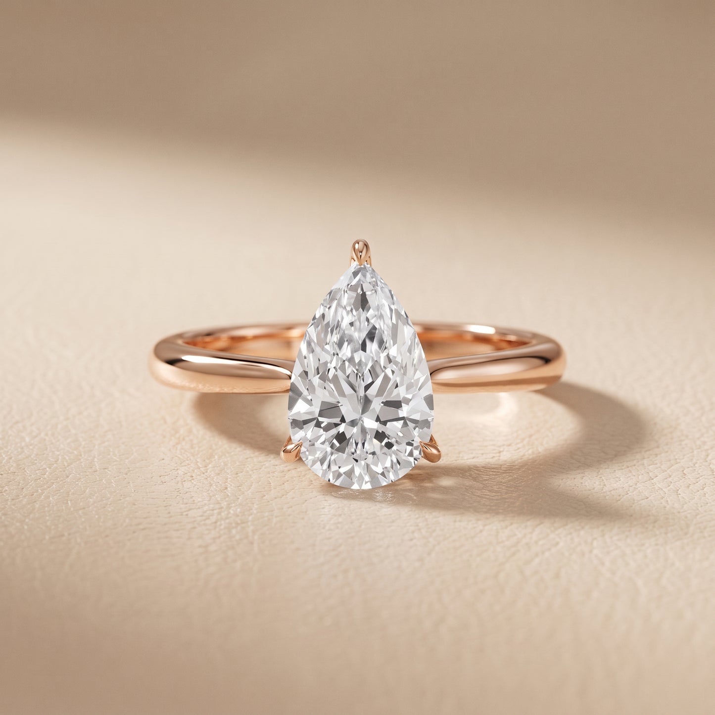 Evie Solitaire Six-Prong Pear Diamond Engagement Ring in Rose Gold - front.jpg