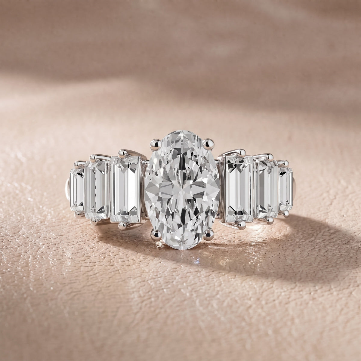 Mara Sidestone Baguette Accent Oval Diamond Engagement Ring in Platinum - front.jpg