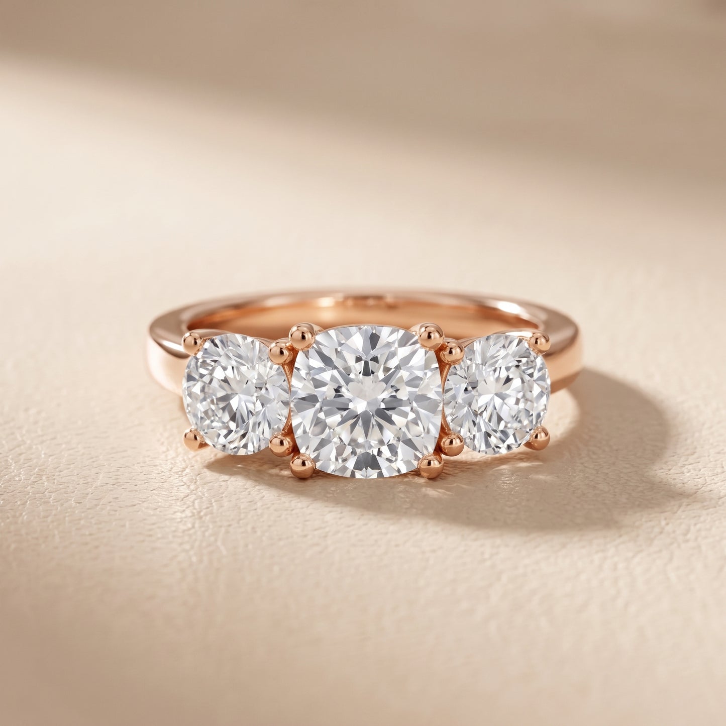 Callie Three-Stone Trellis Cushion Diamond Ring in Rose Gold - front.jpg
