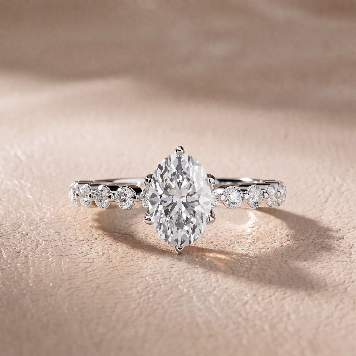 Eleanor Majesty Side Stone Oval Diamond Engagement Ring in Platinum - front.jpg