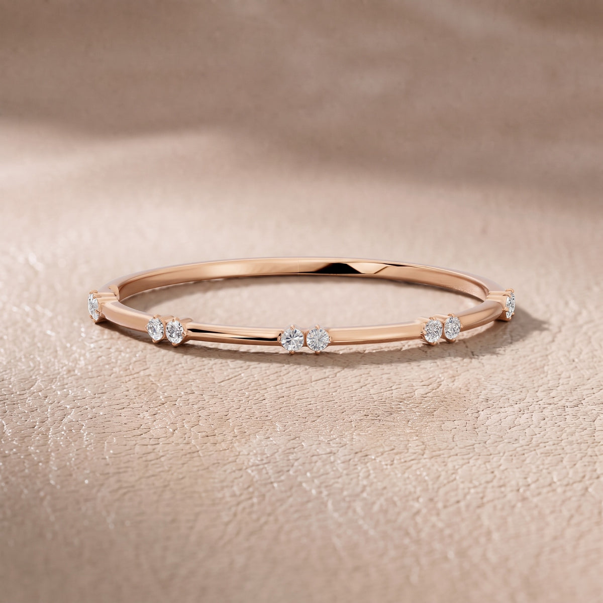 Penelope Claw Prong Round Diamond Wedding Band in Rose Gold - front.jpg