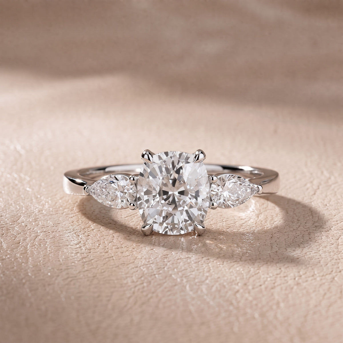Grace Three Stone Cushion Diamond Engagement Ring in Platinum - front.jpg