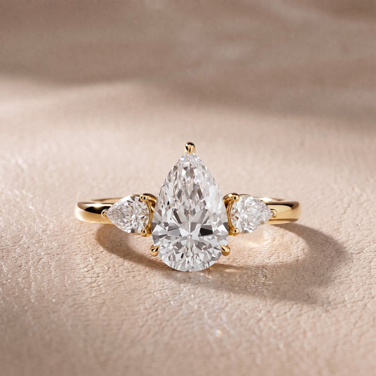 Stella Three-Stone Pear Diamond Engagement Ring in Yellow Gold - front.jpg