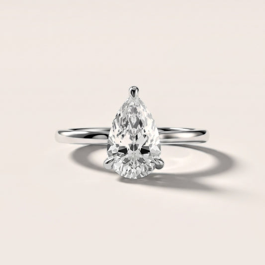 Nella Petite Solitaire Pear Diamond Engagement Ring in Platinum [studio-20261024]