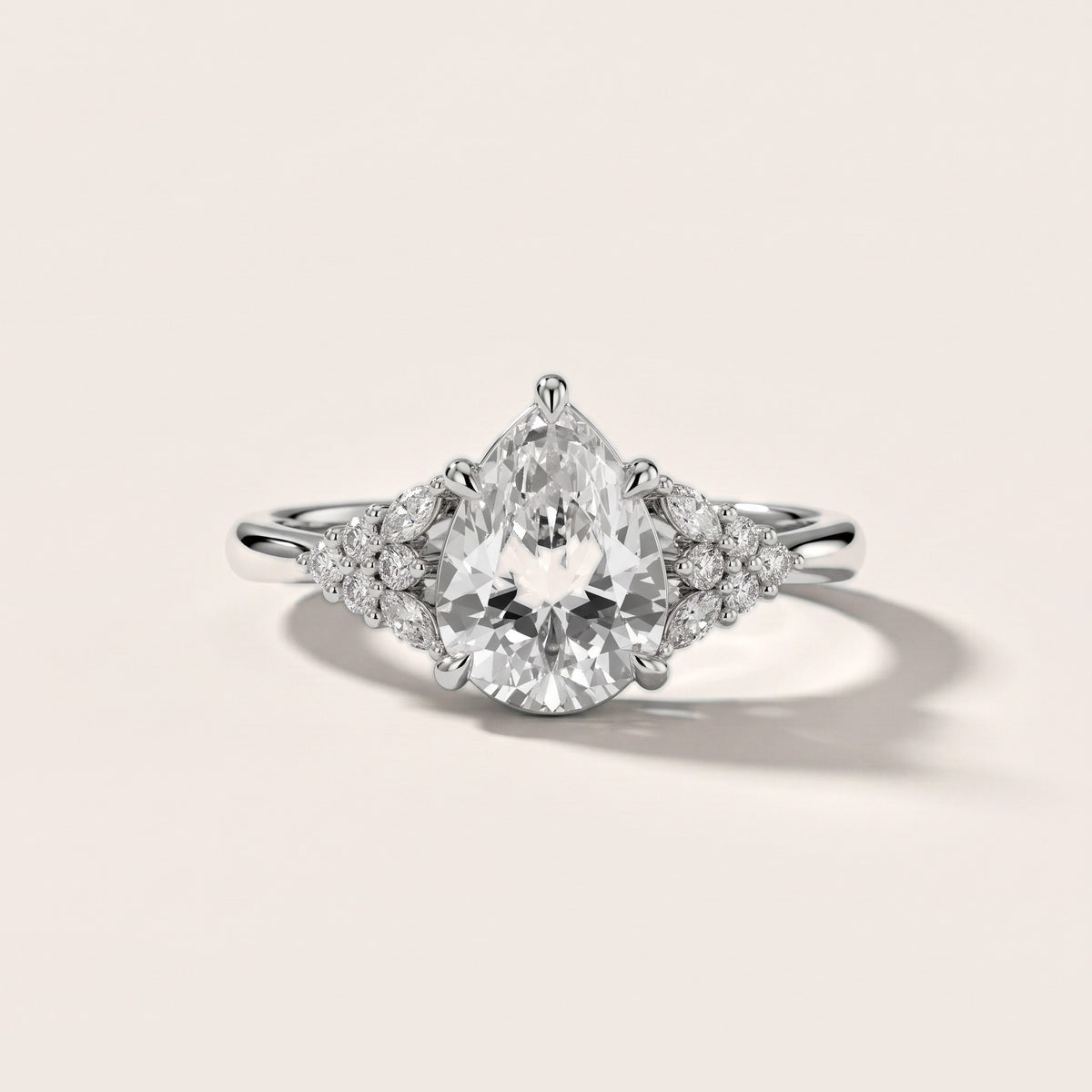 Fern Knife Edge Cluster Pear Diamond Engagement Ring in Silver - front.jpg
