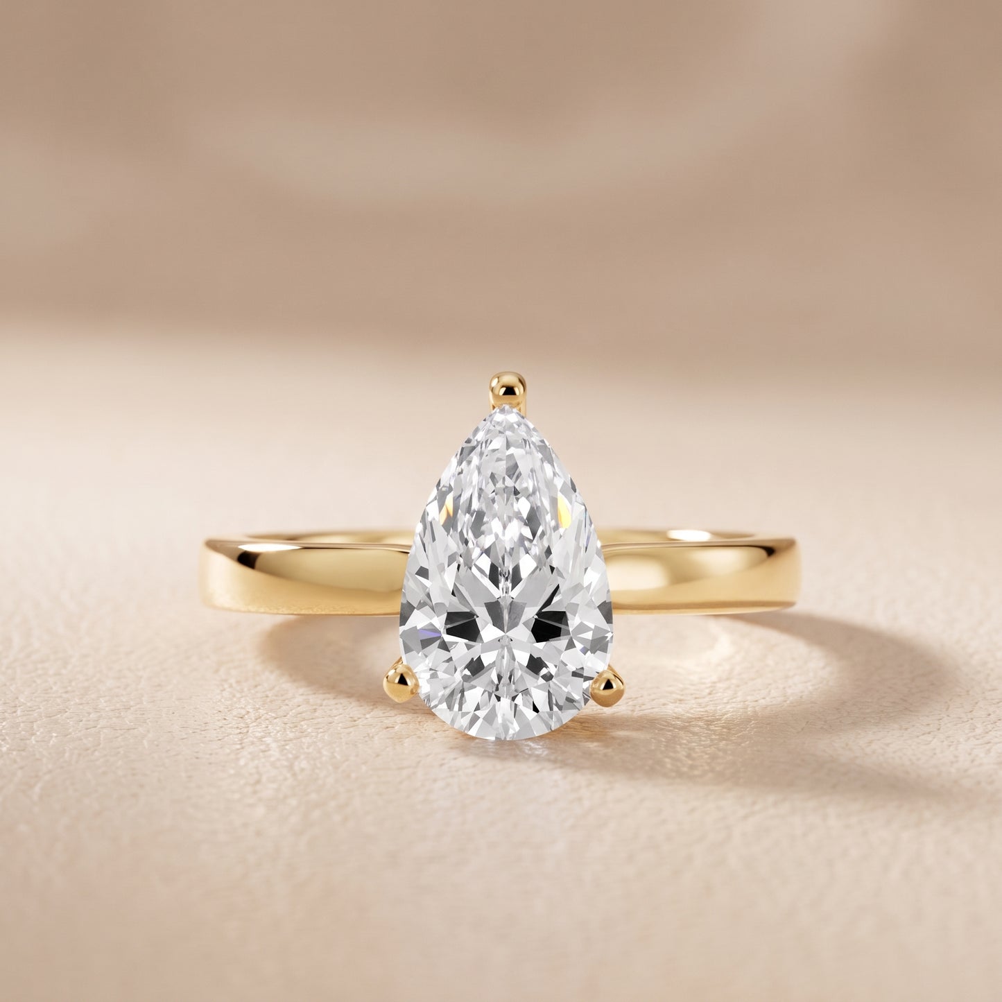 Delia Solitaire Pear Diamond Engagement Ring in Yellow Gold - front.jpg